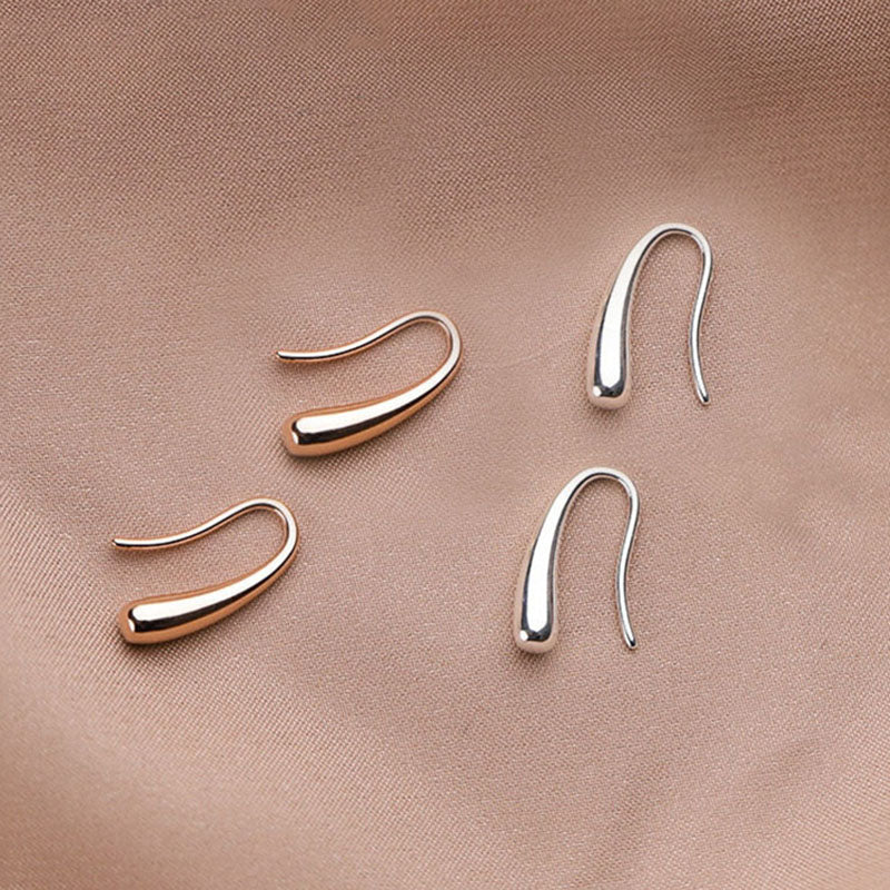 Élégantes Boucles d'Oreilles Pendantes en Or et Argent au Design Raffiné