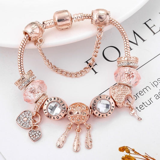 Charmant Bracelet Attrape-rêves Rose avec Breloques Argentées Incluses