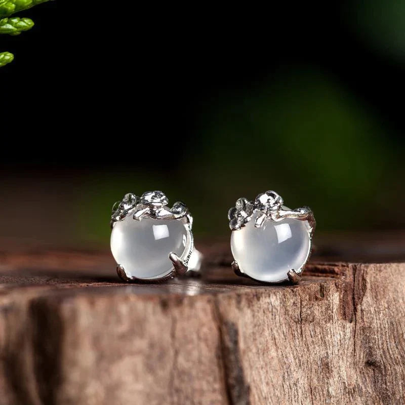 Éclatante paire de boucles d'oreilles en cristal de lune argenté