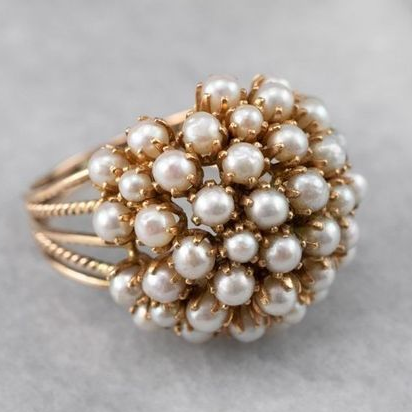 Charmante bague ornée de perles élégantes