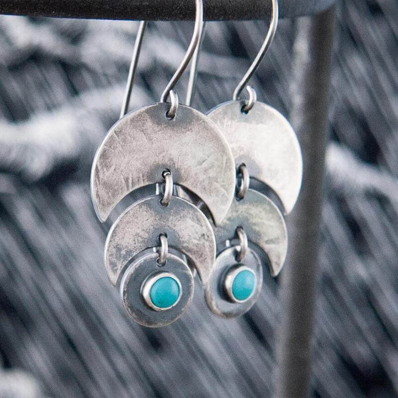 Boucles d'oreilles rétro en argent avec éclat de pierre bleue