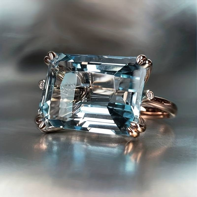 Élégante bague vintage ornée de zircon bleu éblouissant